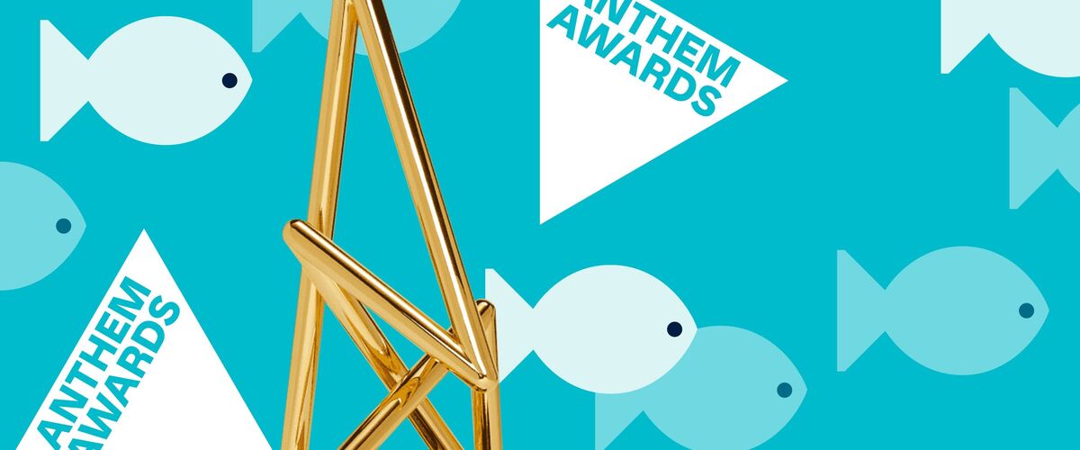 Gold Anthem Award surrounded by fish
