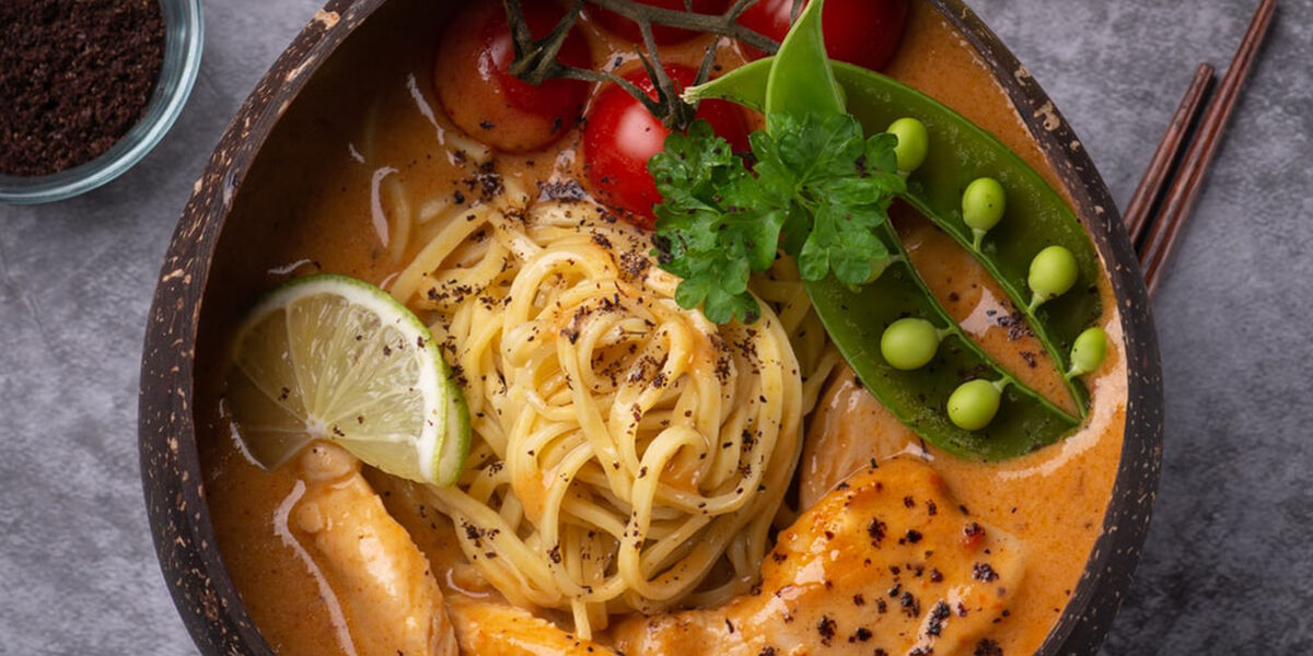 Bowl of thai style wild caught fish curry